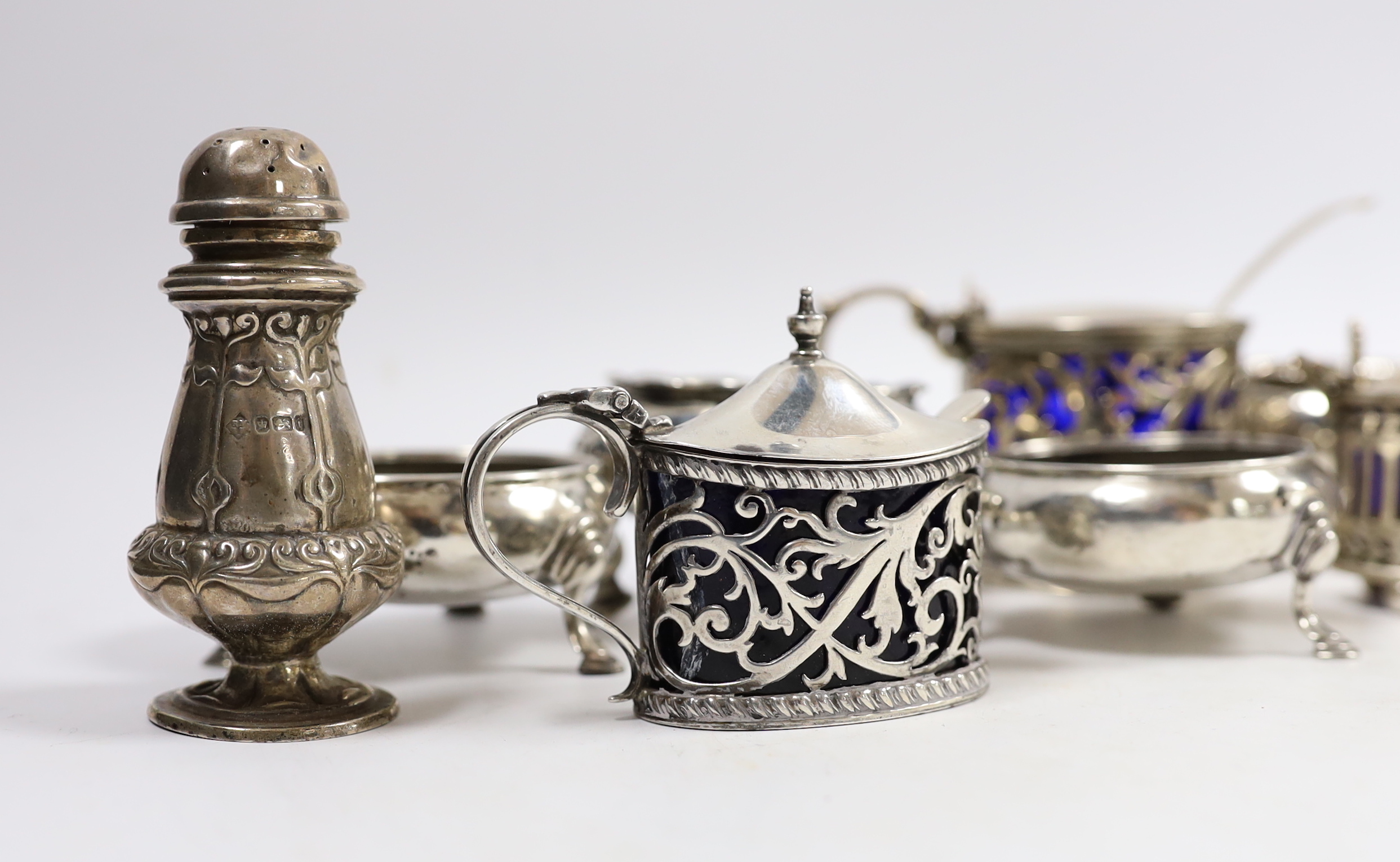 Eleven assorted antique and later silver bun salts, pepperettes and mustard pots including Victorian drum mustard, London, 1853.